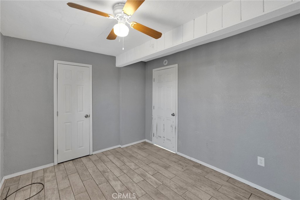 33454 Hampton Way Daggett, CA 92327 - Photo 11 of 17 a view of an empty room and chandelier fan