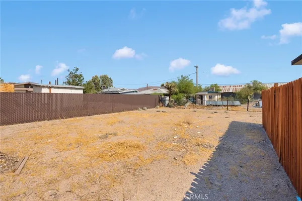 a view of a backyard of a house