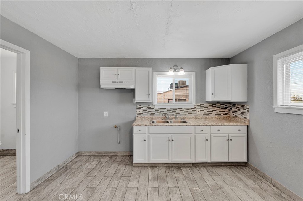 33454 Hampton Way Daggett, CA 92327 - Photo 5 of 17 a bathroom with a sink and a mirror