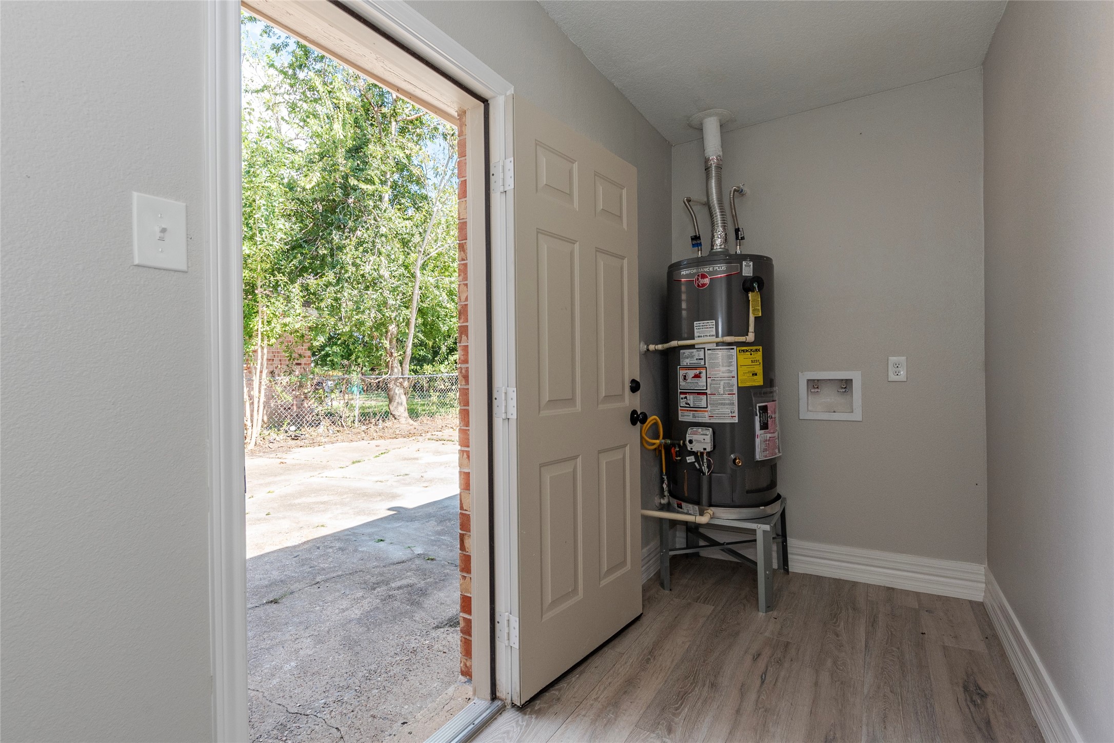 4813 Cedar Street Pasadena, TX 77586 - Photo 26 of 41 Laundry room and access to back yard (washer & dryer are included just not pictured)