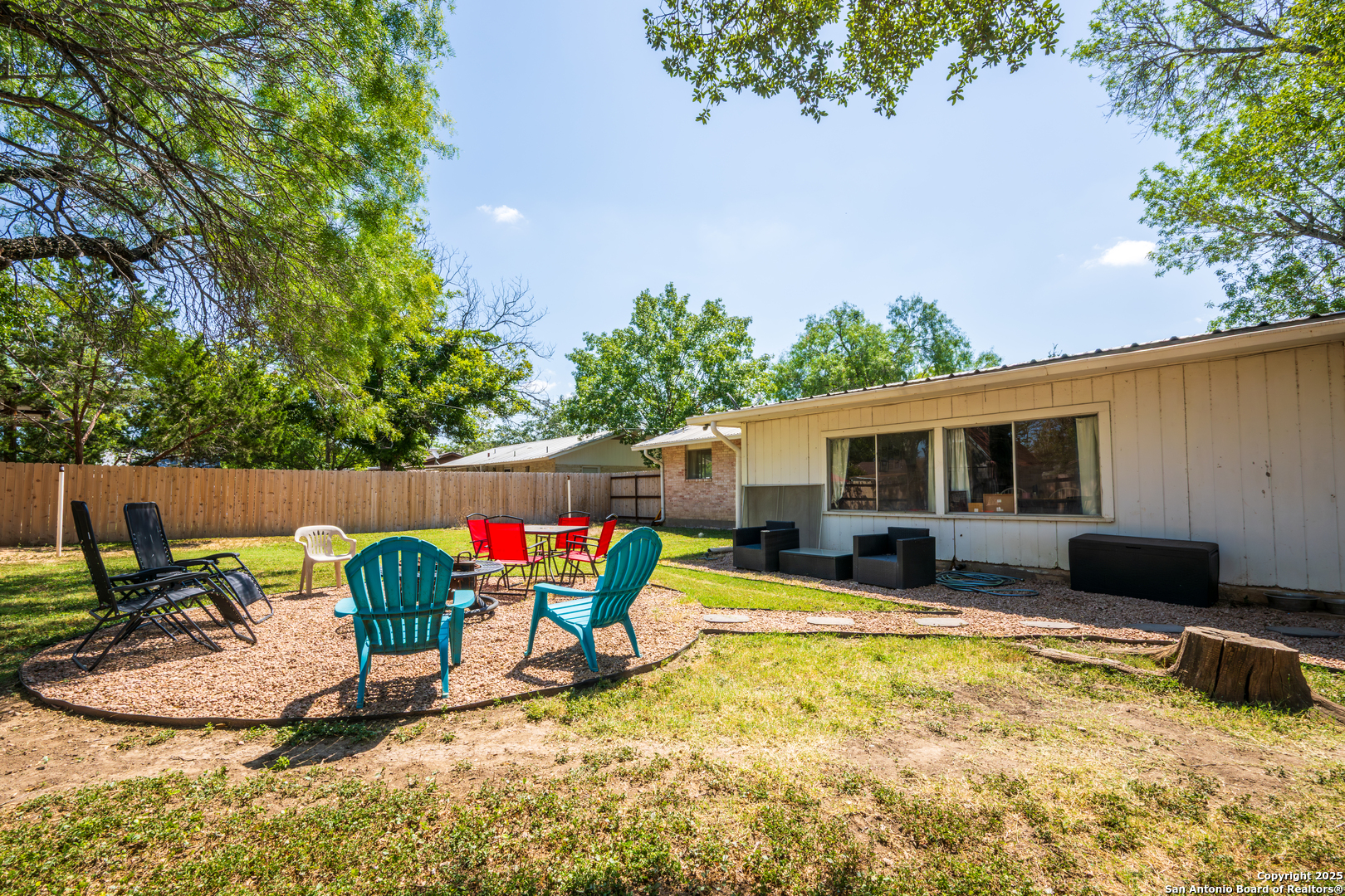 112 East Knippa Street Uvalde, TX 78801 - Photo 11 of 14 a view of a house with a yard patio and swimming pool