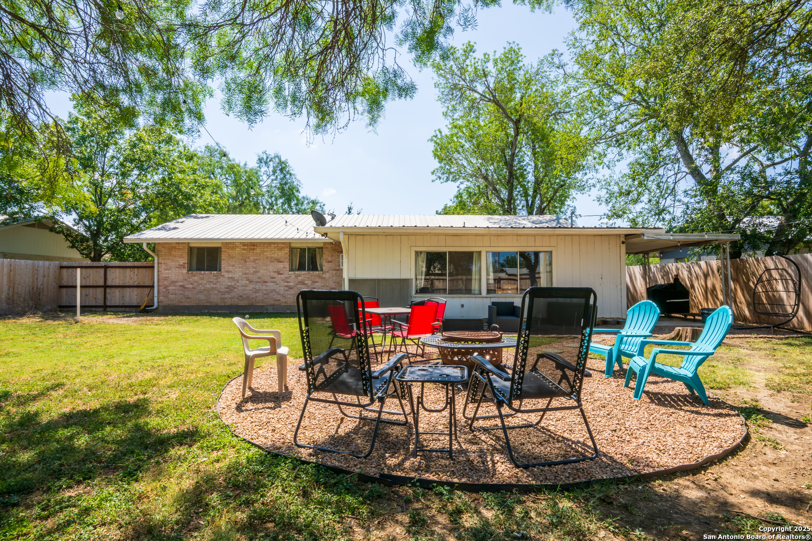 112 East Knippa Street Uvalde, TX 78801 - Photo 12 of 14 a view of a dinning tables and chairs in patio