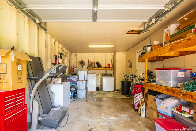 a view of a terrace with a table and chair