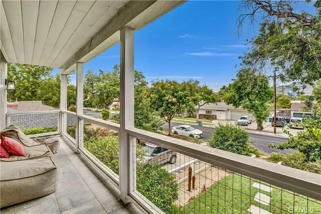 a view of a two chair in the balcony