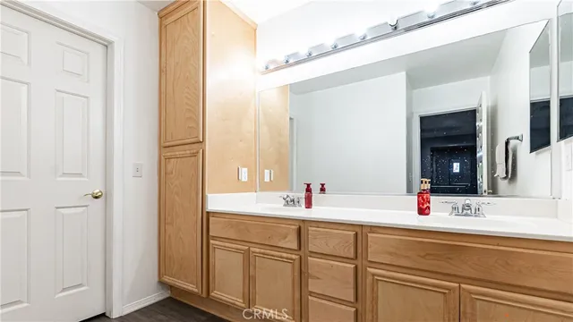 a bathroom with a shower curtain and window