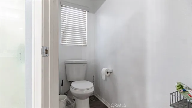 a bathroom with a sink vanity and mirror