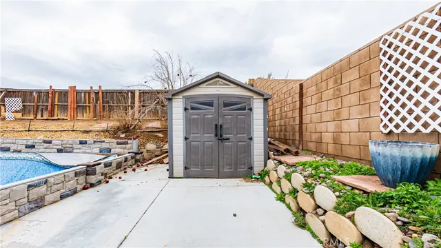 swimming pool view with a outdoor seating