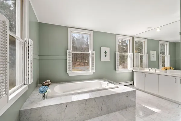 a living room with furniture and window