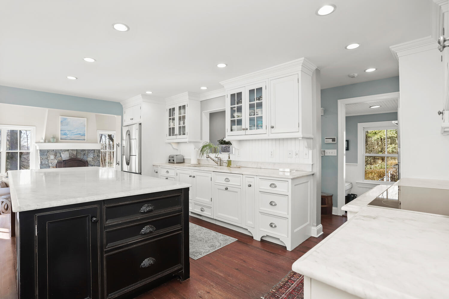 829 Hollow Tree Ridge Road Darien, CT 06820 - Photo 11 of 40 a kitchen with a sink stove and cabinets
