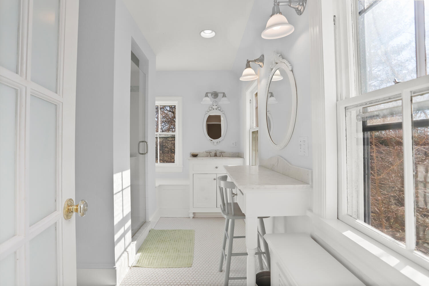 829 Hollow Tree Ridge Road Darien, CT 06820 - Photo 26 of 40 a bathroom with a sink a light fixture and a mirror