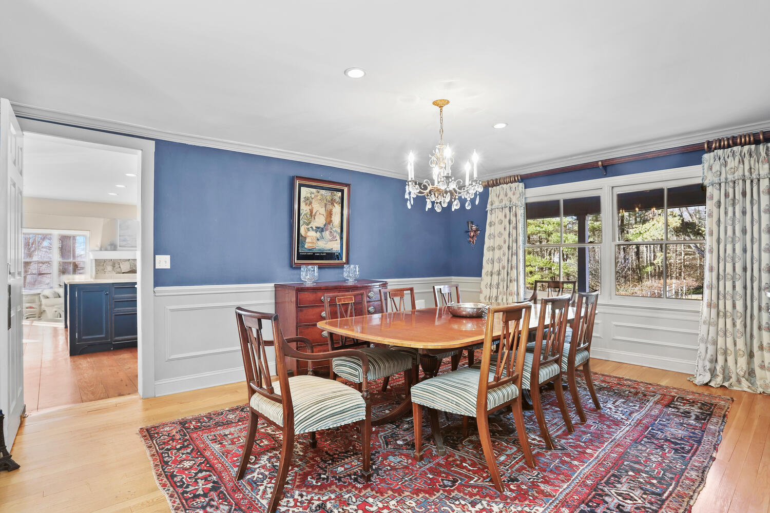 829 Hollow Tree Ridge Road Darien, CT 06820 - Photo 8 of 40 a view of a dining room with furniture window and wooden floor