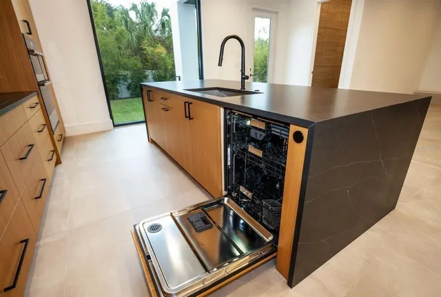a white bath tub sitting in a bathroom