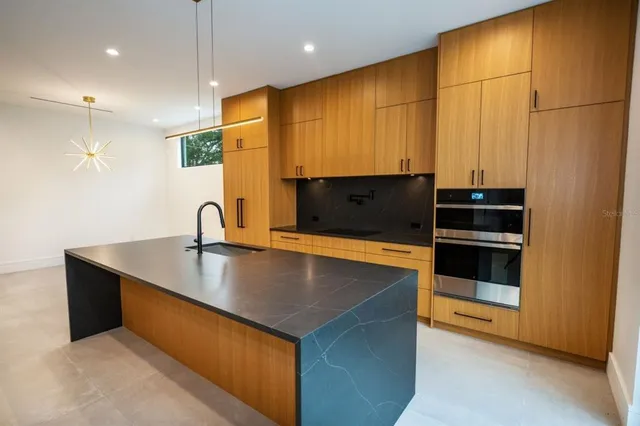 a bathroom with a toilet sink and tub