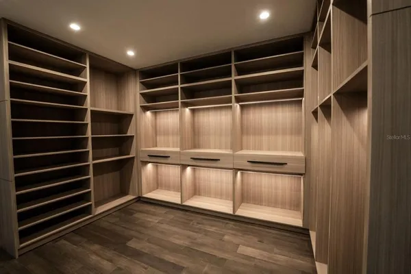 a view of a room with racks on the wall