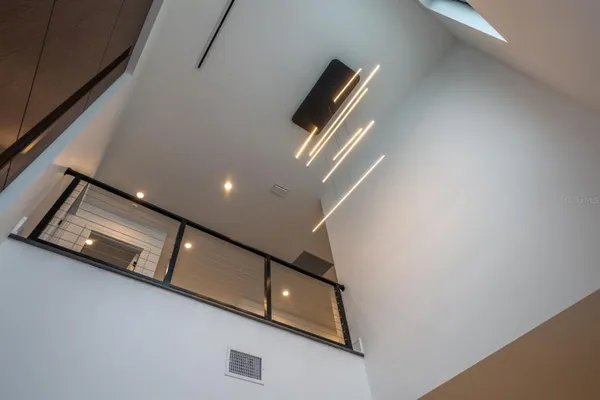 a view of kitchen with stainless steel appliances a refrigerator and a kitchen