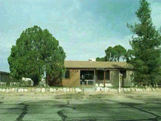 517 East Pastime Road Tucson, AZ 85705 - Photo 1 of 1 a front view of a house with a garden