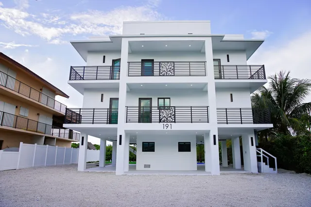 a view of building with a porch