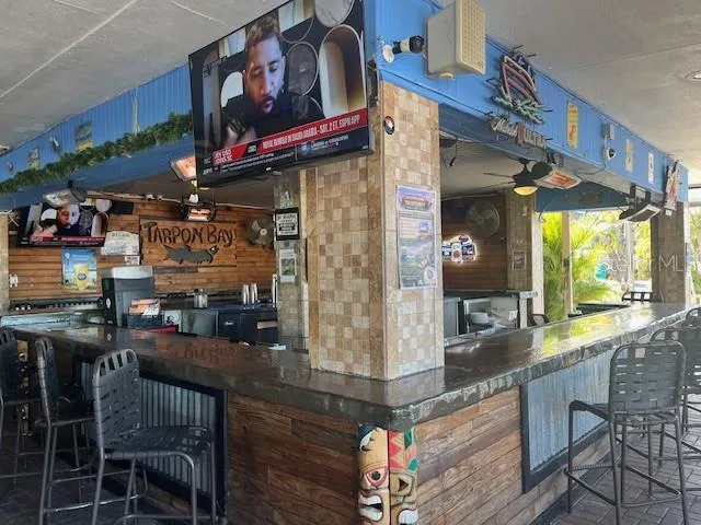 a view of a swimming pool with a yard