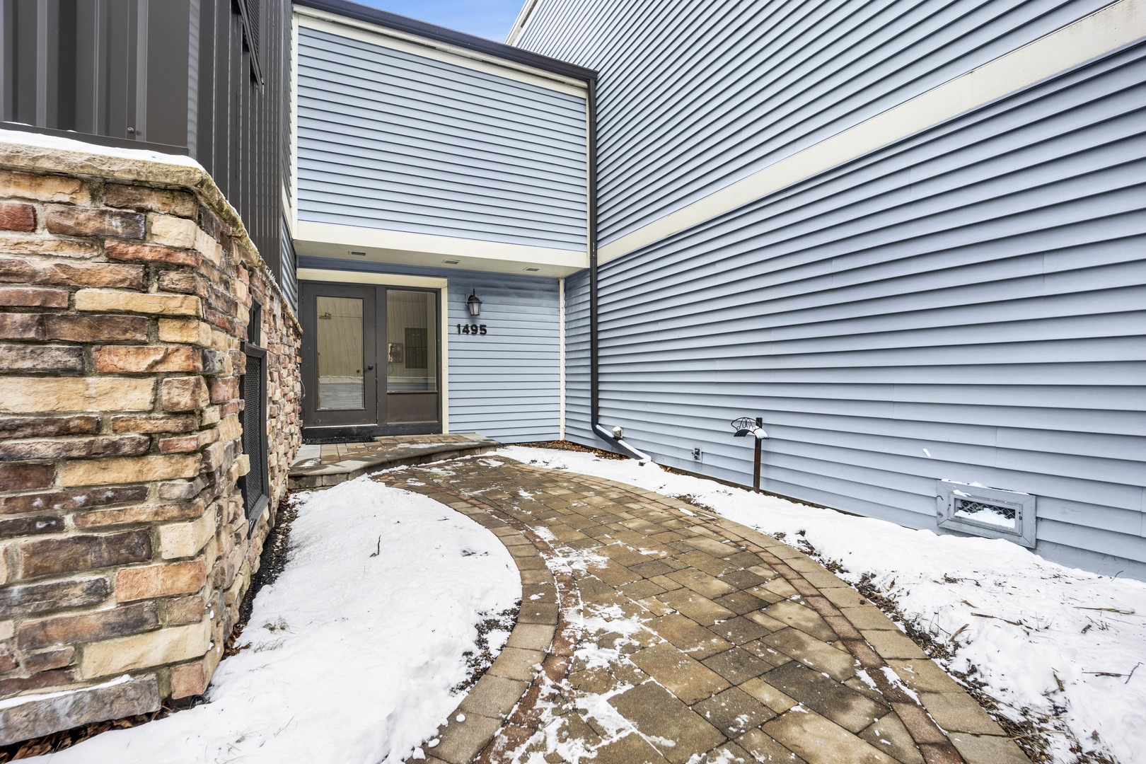 1495 South County Farm Road, Unit 12 Wheaton, IL 60189 - Photo 1 of 22 a view of backyard of a house