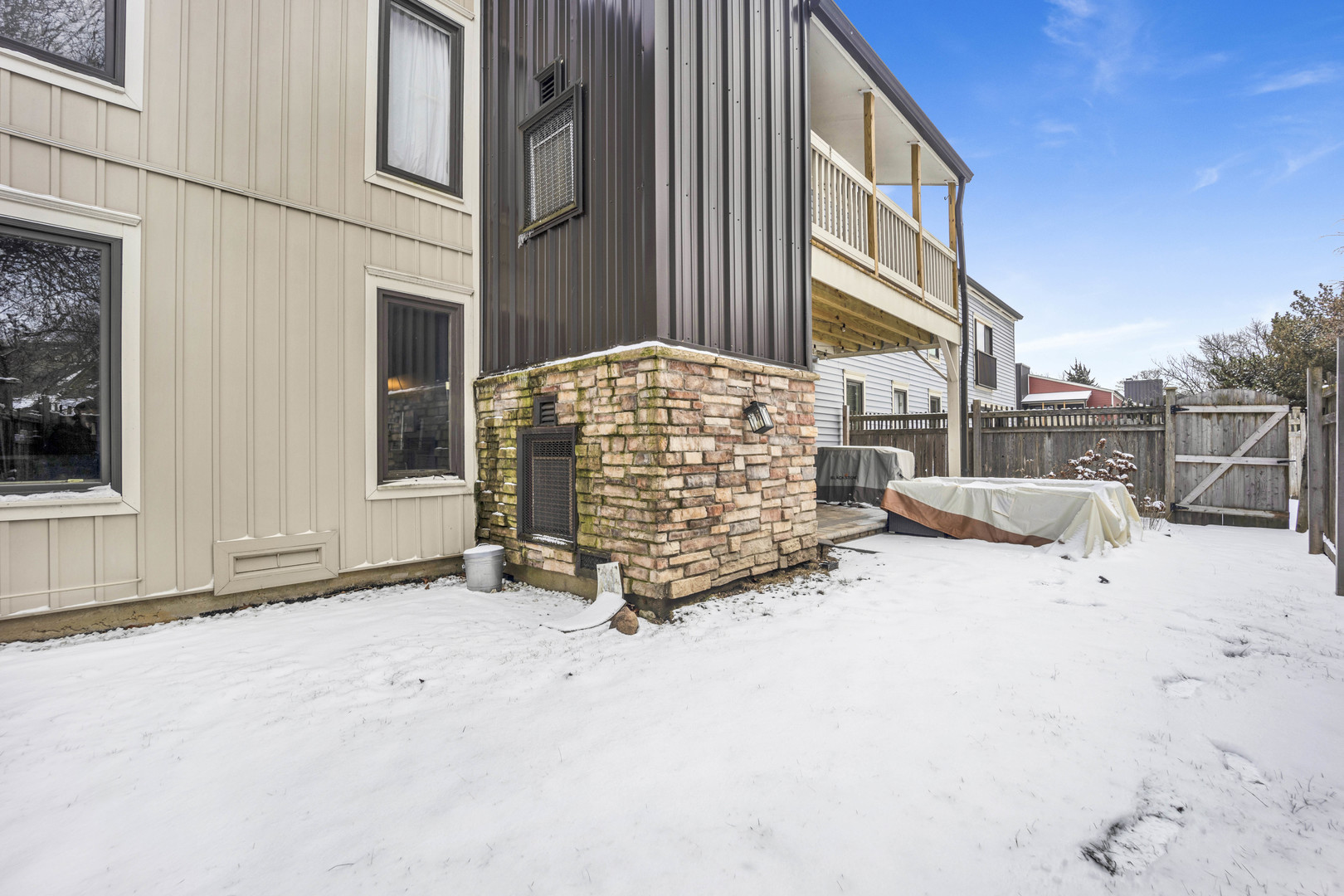 1495 South County Farm Road, Unit 12 Wheaton, IL 60189 - Photo 20 of 22 a view of entryway with brick walls