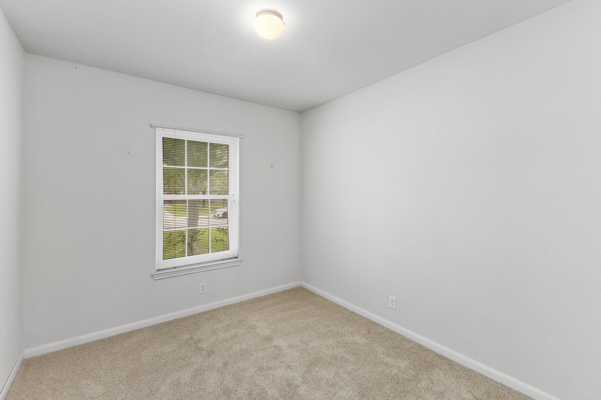 290 Bailey Loop Kyle, TX 78640 - Photo 27 of 33 Neutral-toned wall paint and carpet flooring