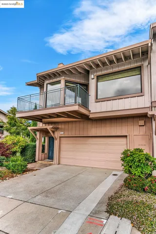 a view of a house with a garage