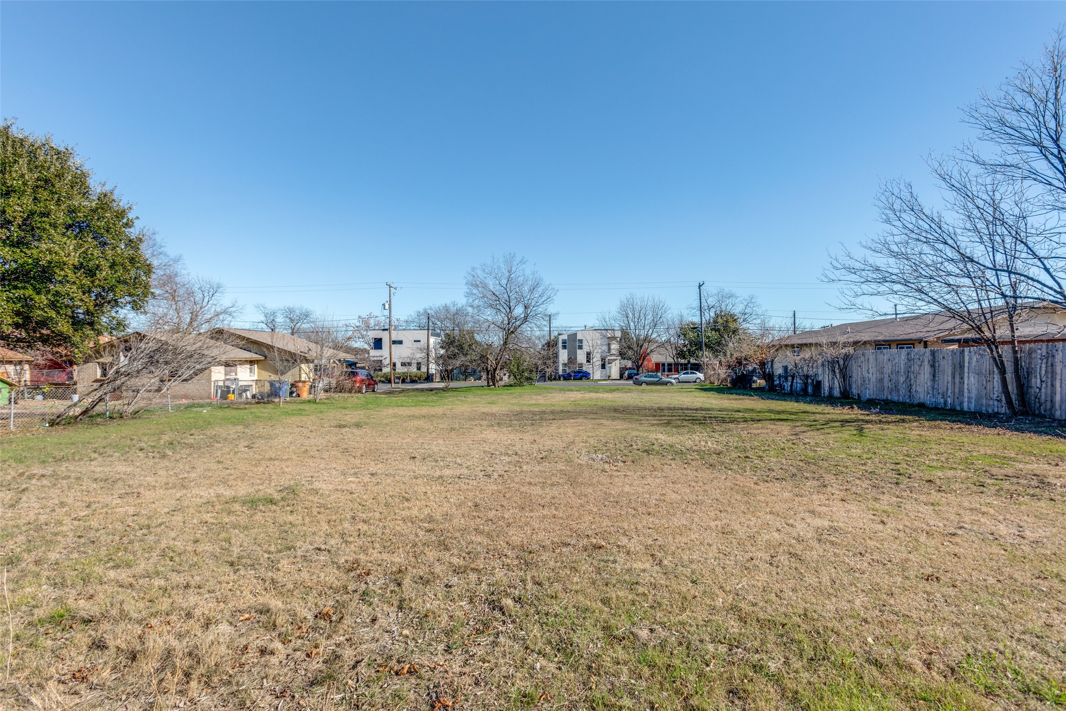 6908 Blessing Avenue Austin, TX 78752 - Photo 8 of 13 a swimming pool with wooden fence
