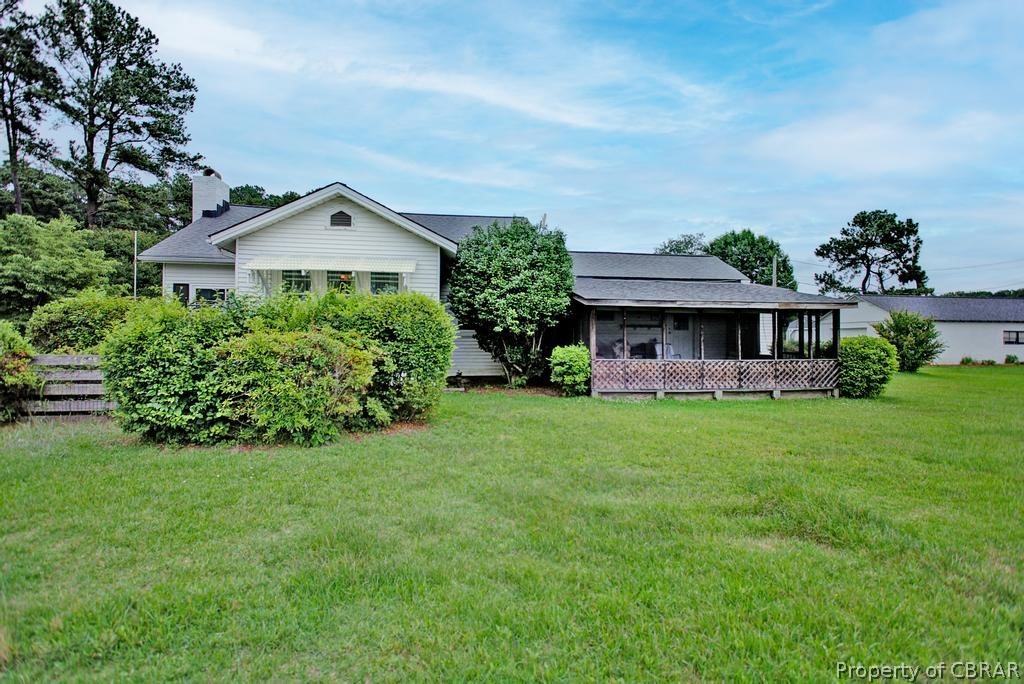 5435 Ark Road Gloucester, VA 23061 - Photo 6 of 31 view from side yard back to house