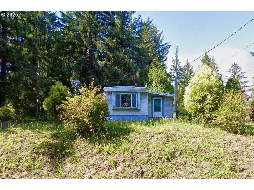 a view of a house in a yard