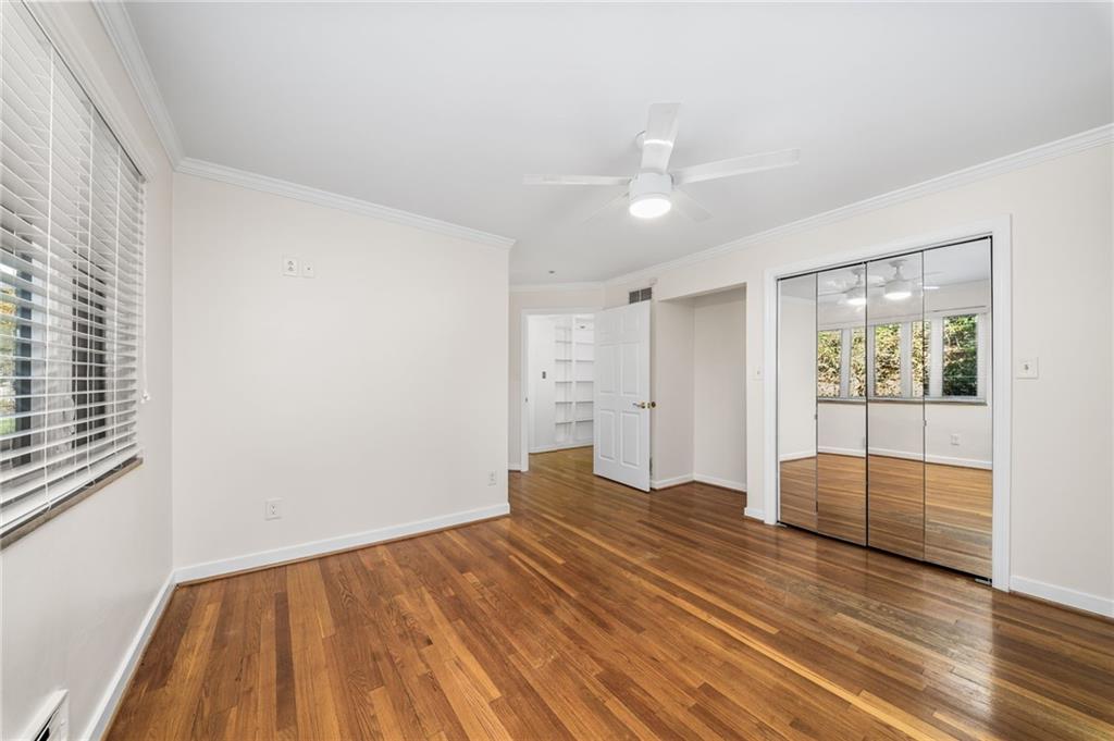 101 Buckingham Road Pittsburgh, PA 15215 - Photo 15 of 44 a view of an empty room with wooden floor and a window