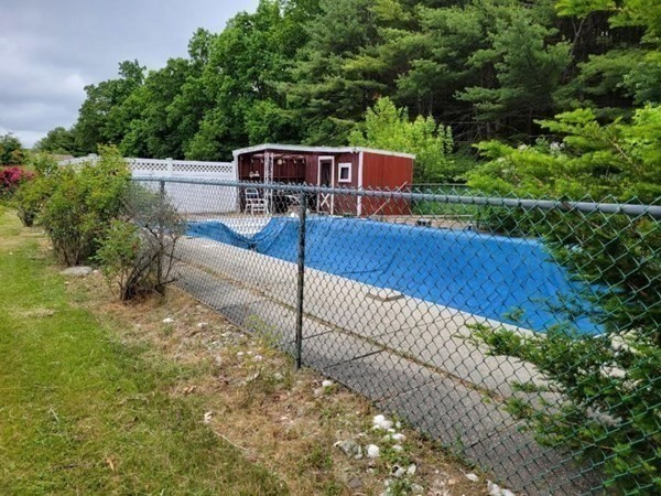 235 Belchertown Road Ware, MA 01082 - Photo 11 of 27 a view of a deck with a bench