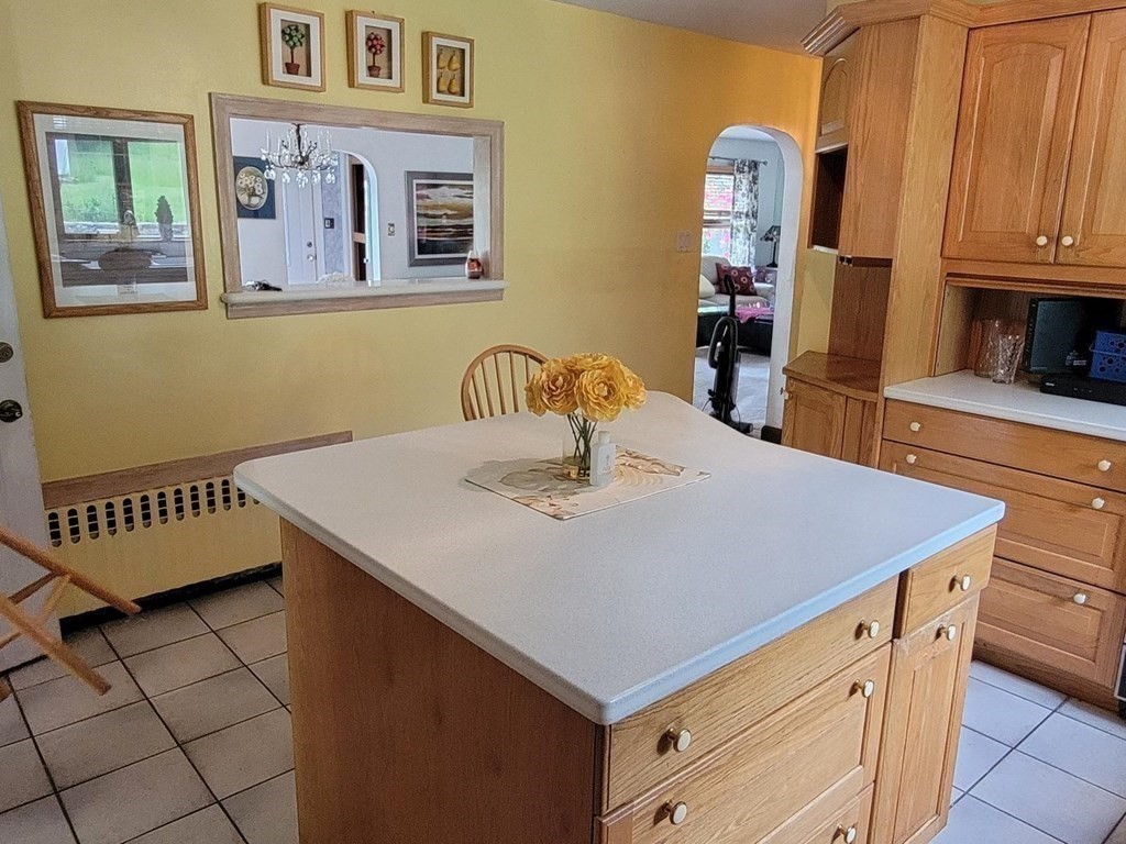 235 Belchertown Road Ware, MA 01082 - Photo 14 of 27 a kitchen with a sink a stove and cabinets