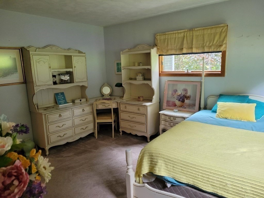 235 Belchertown Road Ware, MA 01082 - Photo 22 of 27 a bedroom with a bed and a window