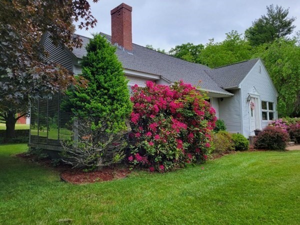 235 Belchertown Road Ware, MA 01082 - Photo 3 of 27 a view of a flowers in front of a house