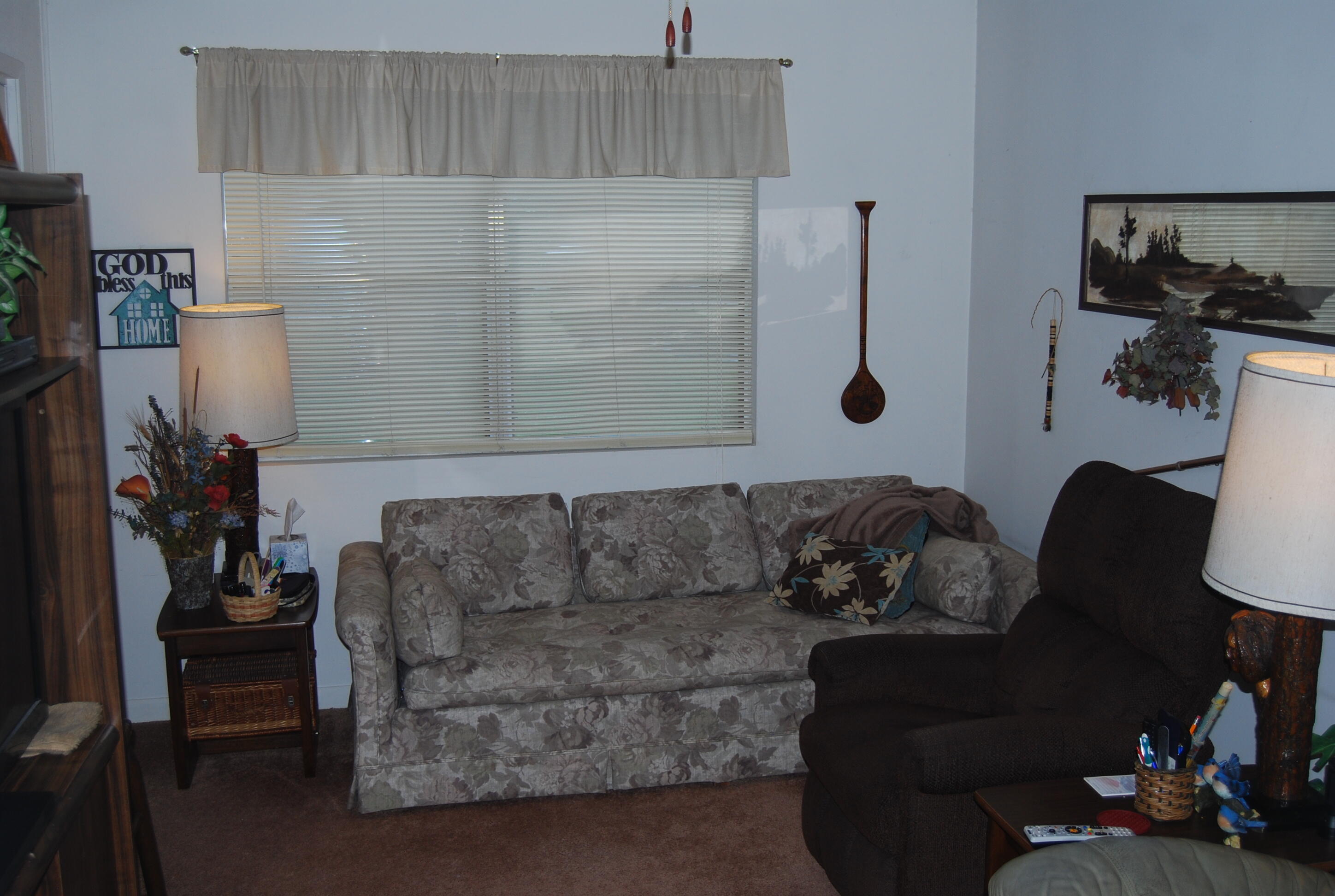 791 Dr Nelson Road DeFuniak Springs, FL 32433 - Photo 13 of 46 a living room with furniture and a potted plant