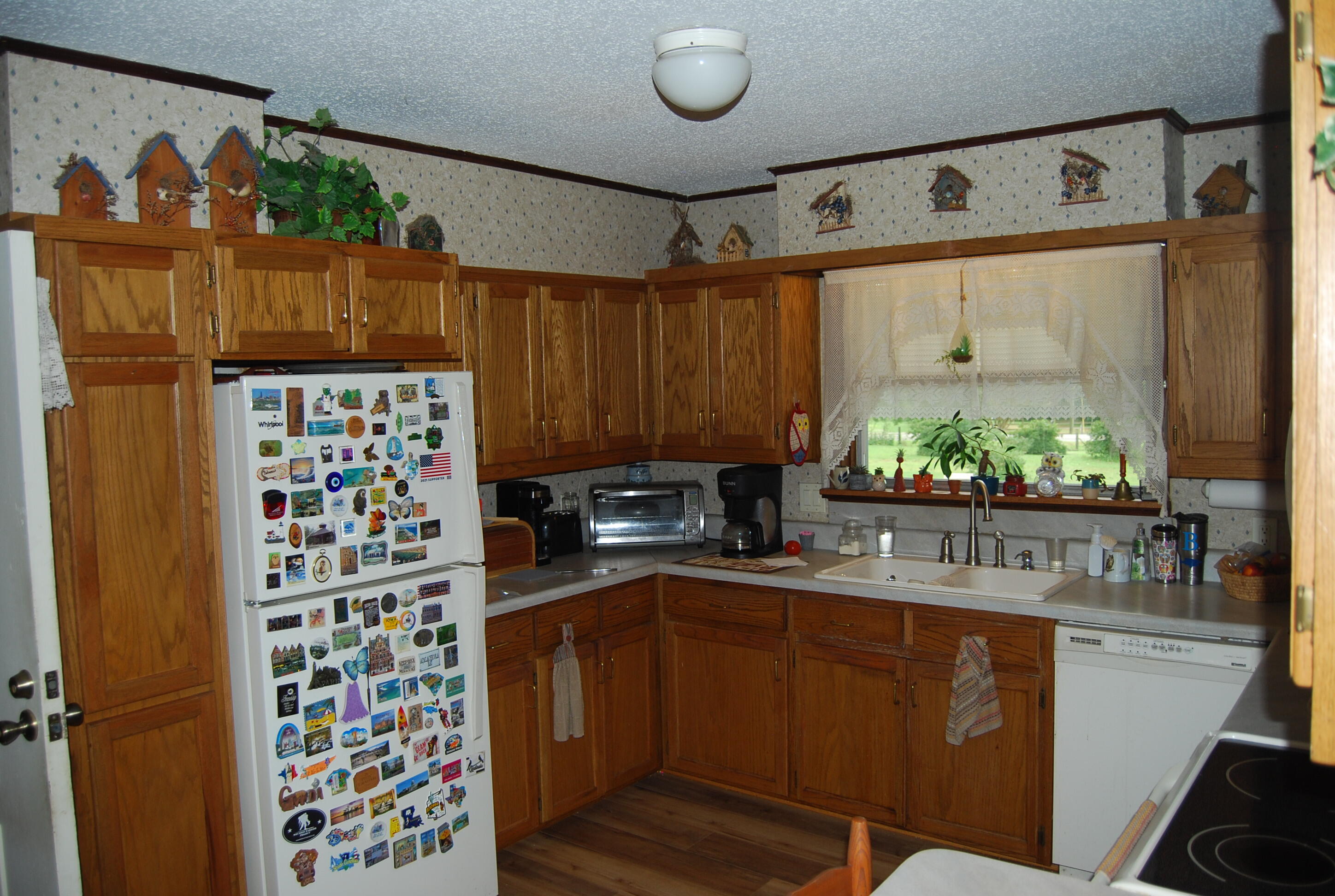 791 Dr Nelson Road DeFuniak Springs, FL 32433 - Photo 10 of 46 a kitchen with granite countertop a sink and a stove