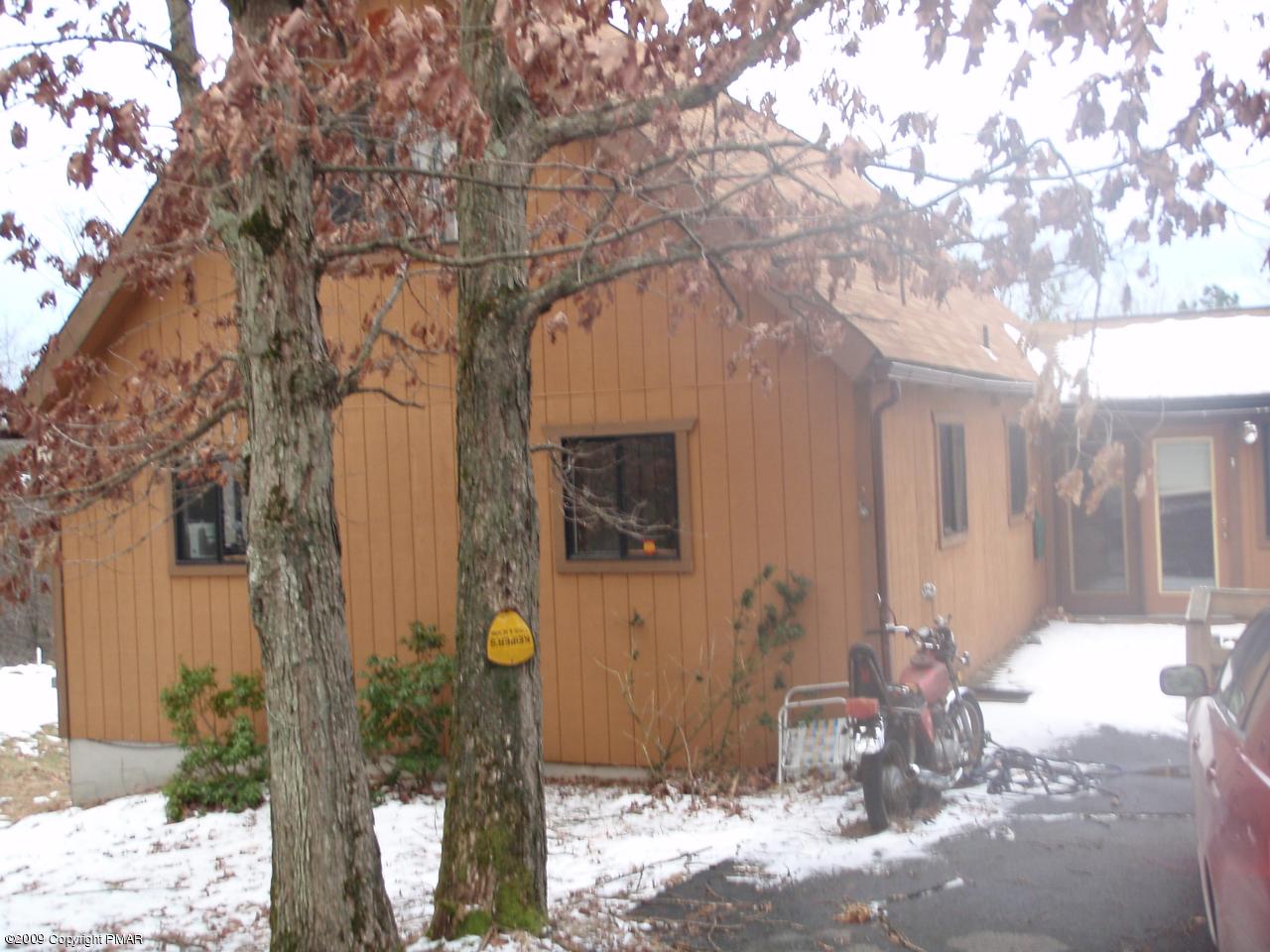 5733 North Clover Road Long Pond, PA 18334 - Photo 2 of 5 a front view of a house with trees