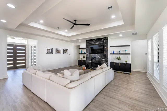 a large bathroom with a double vanity sink and a mirror
