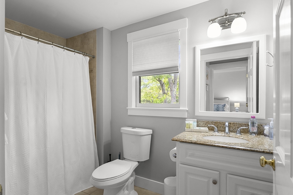 4 Hye Lane Edgartown, MA 02539 - Photo 35 of 41 a bathroom with a granite countertop sink toilet and a mirror