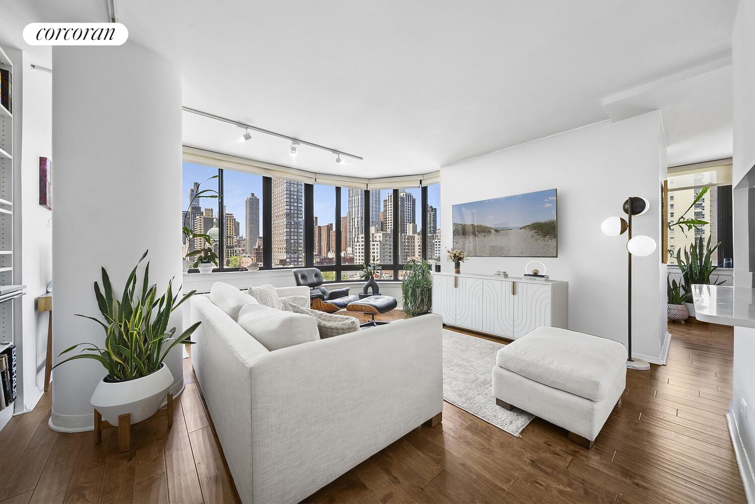 455 East 86th Street, Unit 11AB Manhattan, NY 10028 - Photo 2 of 15 a living room with furniture and wooden floor