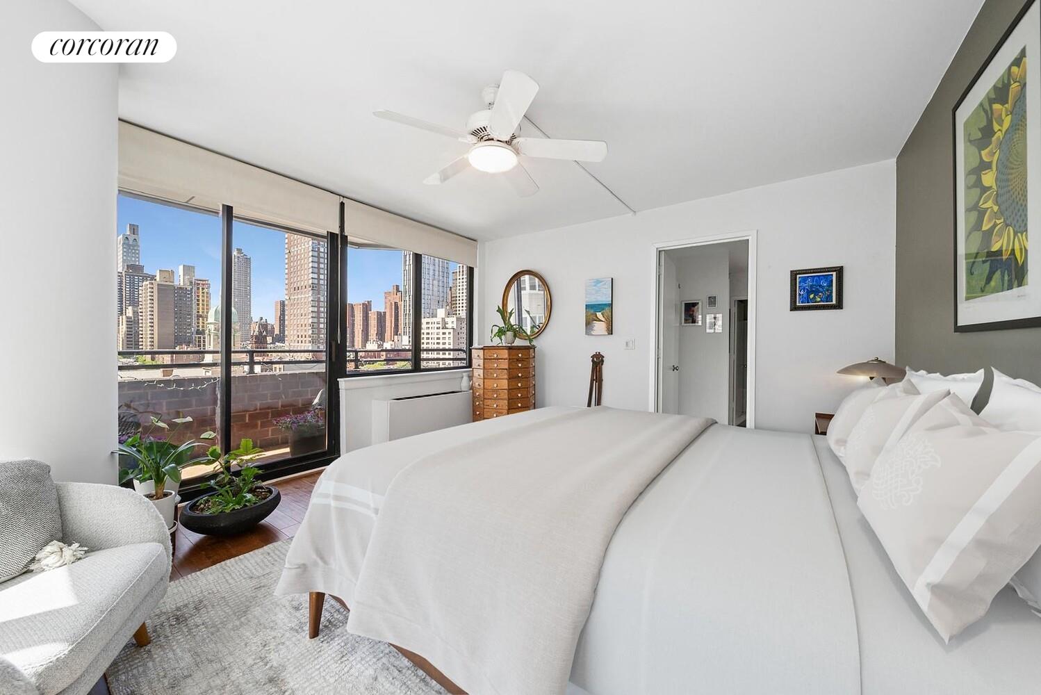 455 East 86th Street, Unit 11AB Manhattan, NY 10028 - Photo 7 of 15 a spacious bedroom with a bed and ceiling fan