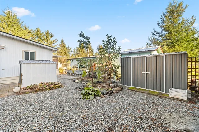 a house view with a backyard space