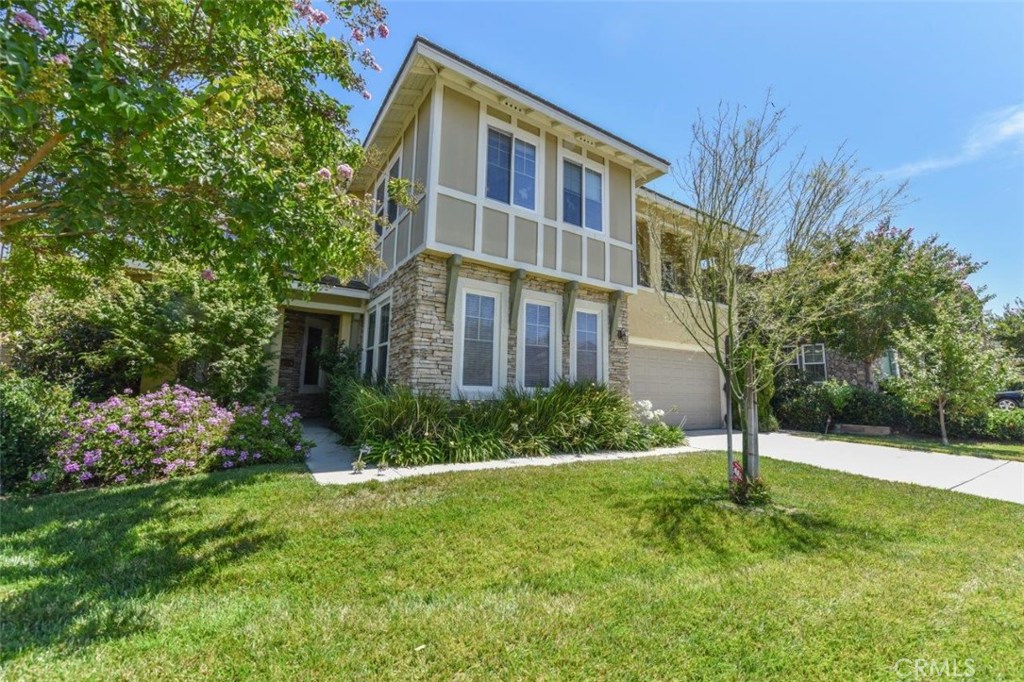 16672 South Peak Court Riverside, CA 92503 - Photo 1 of 1 a front view of a house with a yard