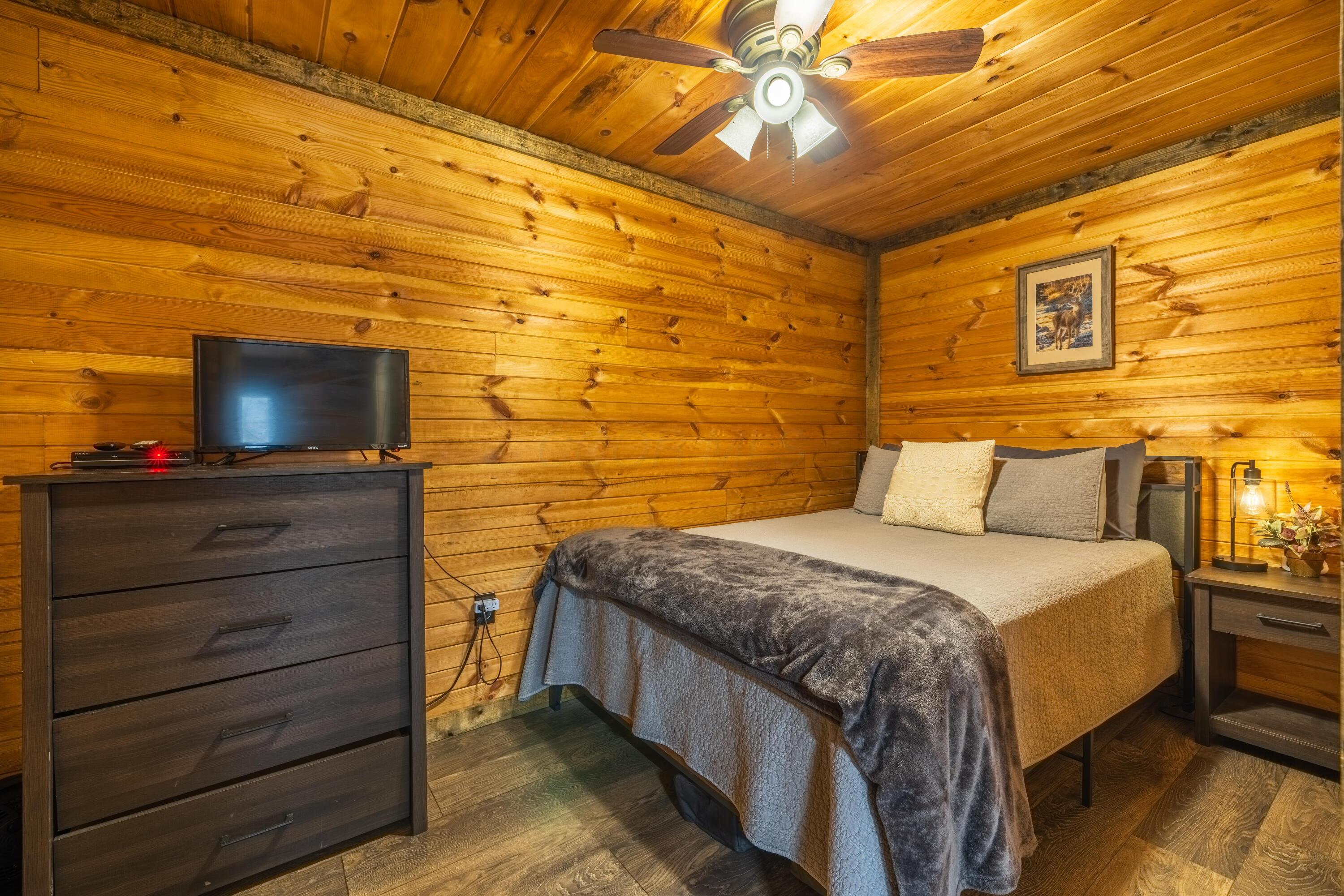 344 Skaggs Road Londonderry, OH 45647 - Photo 45 of 57 Sage Hill Cabin lower level bedroom
