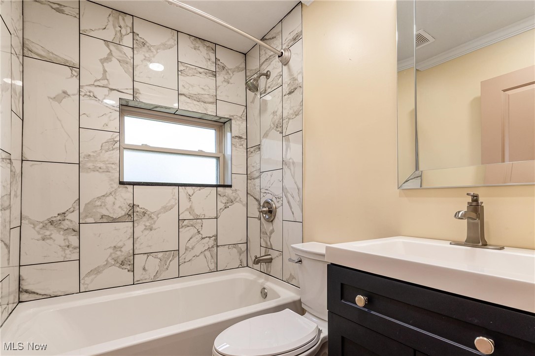 724 Garden Road Zanesville, OH 43701 - Photo 12 of 22 Full bathroom with shower / tub combination and vanity