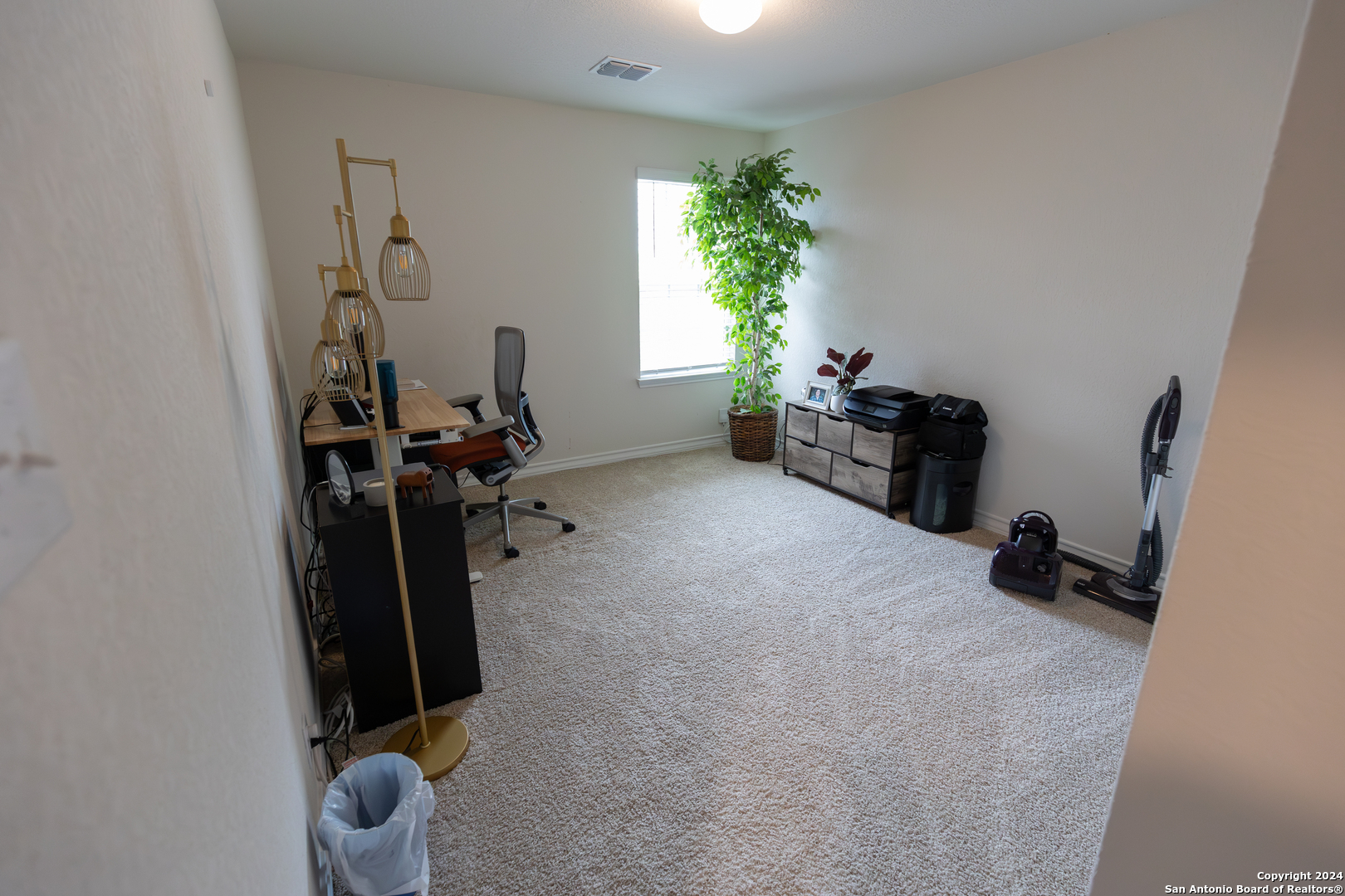 5015 Dancing Gopher San Antonio, TX 78261 - Photo 27 of 43 a view of a room with gym equipment