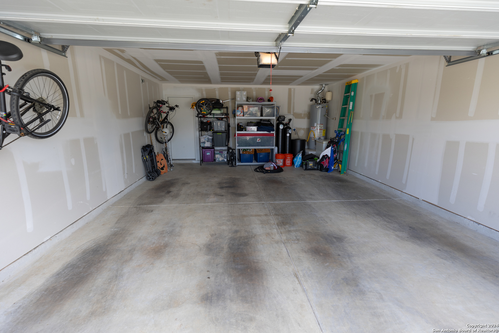 5015 Dancing Gopher San Antonio, TX 78261 - Photo 32 of 43 a view of a garage with storage