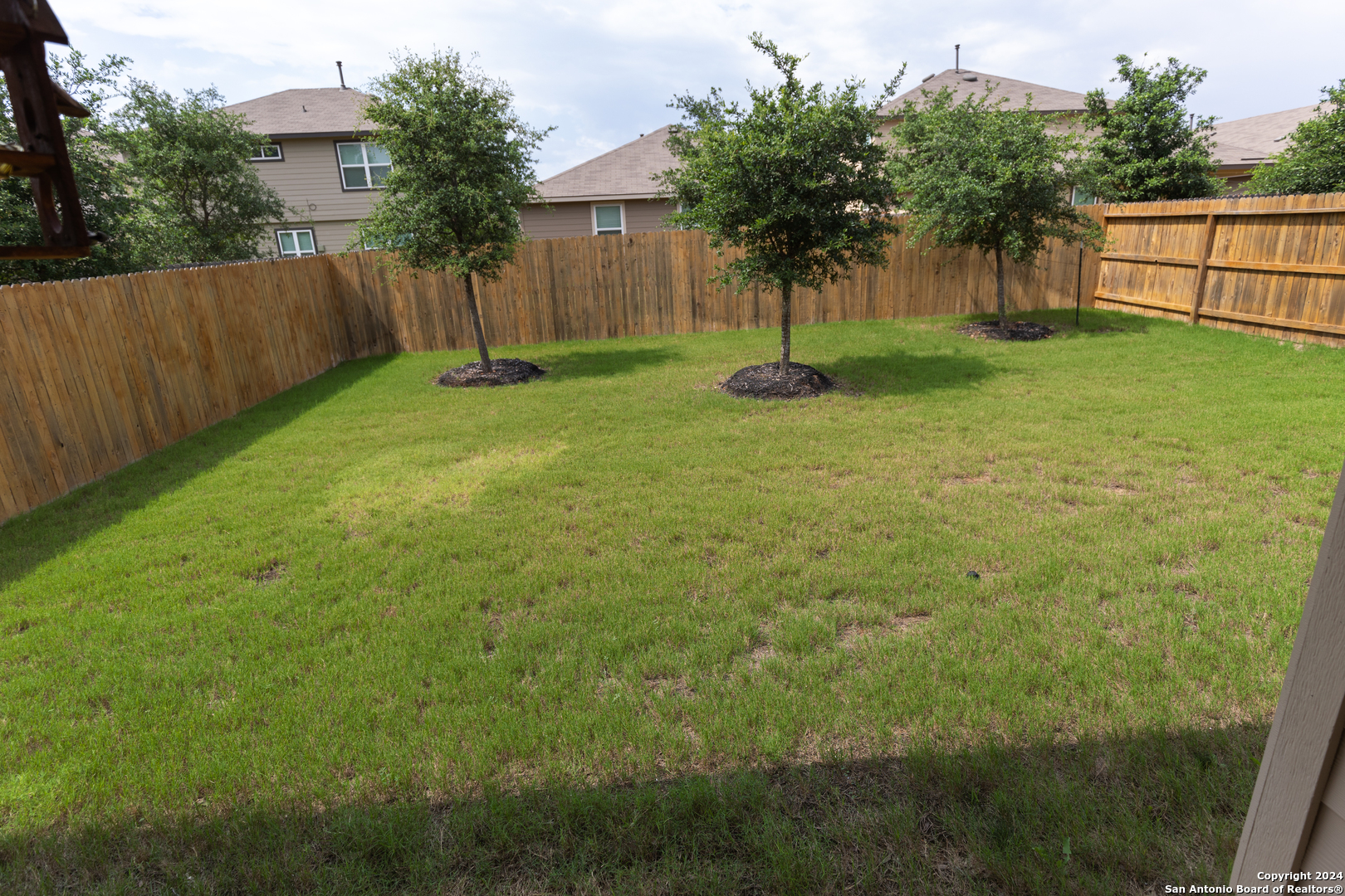 5015 Dancing Gopher San Antonio, TX 78261 - Photo 33 of 43 a view of a backyard with a tree