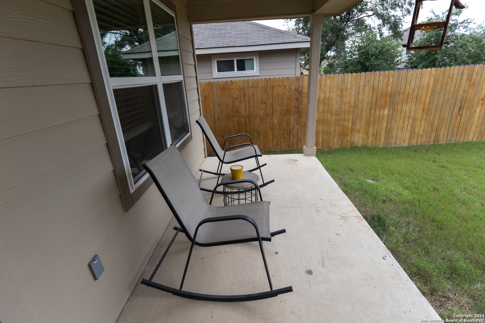 5015 Dancing Gopher San Antonio, TX 78261 - Photo 34 of 43 a view of backyard with a table and chair