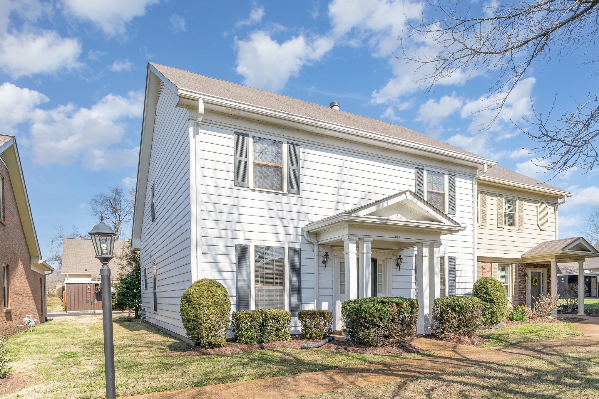 636 General George Patton Road Nashville, TN 37221 - Photo 2 of 32 a front view of a house with garden